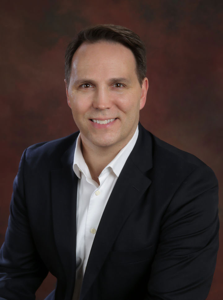 Nik Rebhuhn headshot - Eastside real estate expert